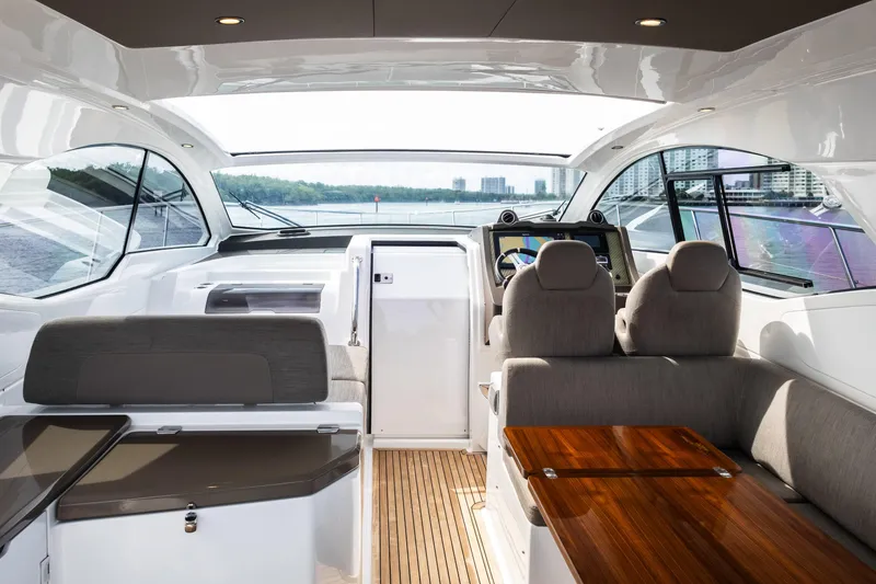 Slide: The Image of Interior of 2019 Azimut Atlantis 43 yacht with modern helm and seating area. - 11