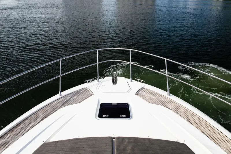 Slide: The Image of Bow view of 2019 Azimut Atlantis 43 yacht cruising on calm waters. - 20