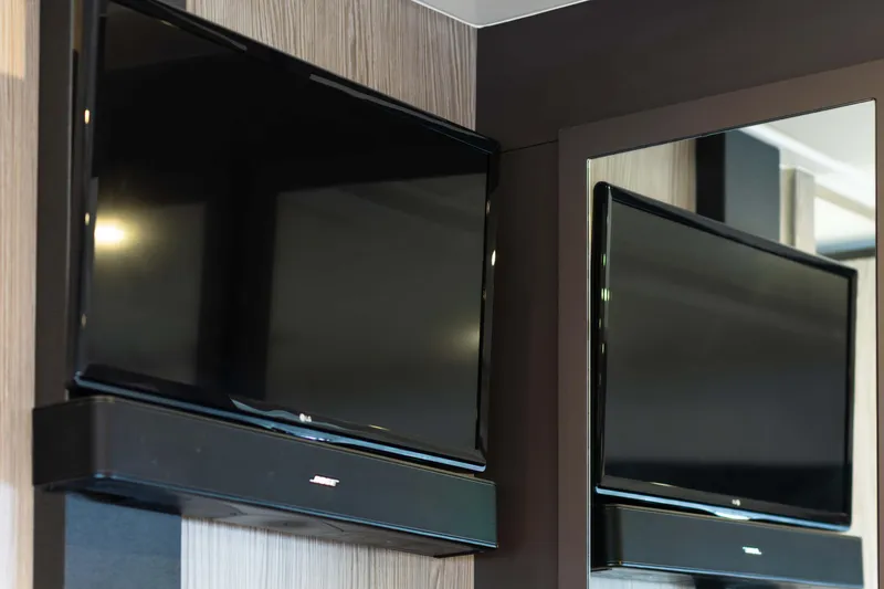 Slide: The Image of Flat-screen TV with soundbar in 2019 Azimut Atlantis 43 yacht interior. - 30