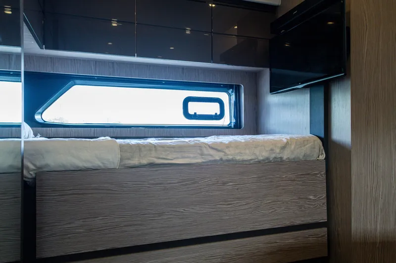 Slide: The Image of Interior cabin of 2019 Azimut Atlantis 43 yacht with bed and window. - 36