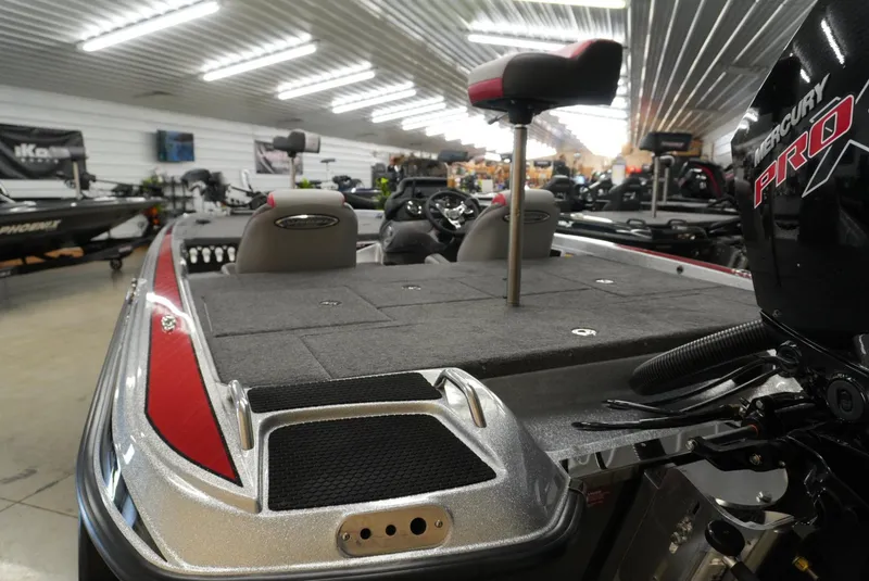 Slide: The Image of 2026 Phoenix 721 ZXL boat in showroom, featuring Mercury Pro engine. - 10