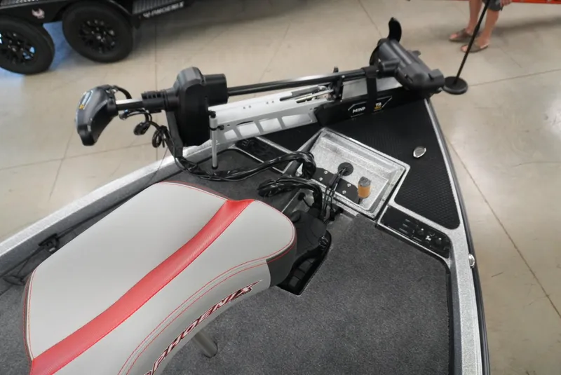 Slide: The Image of 2026 Phoenix 721 ZXL boat interior with trolling motor and seat. - 18