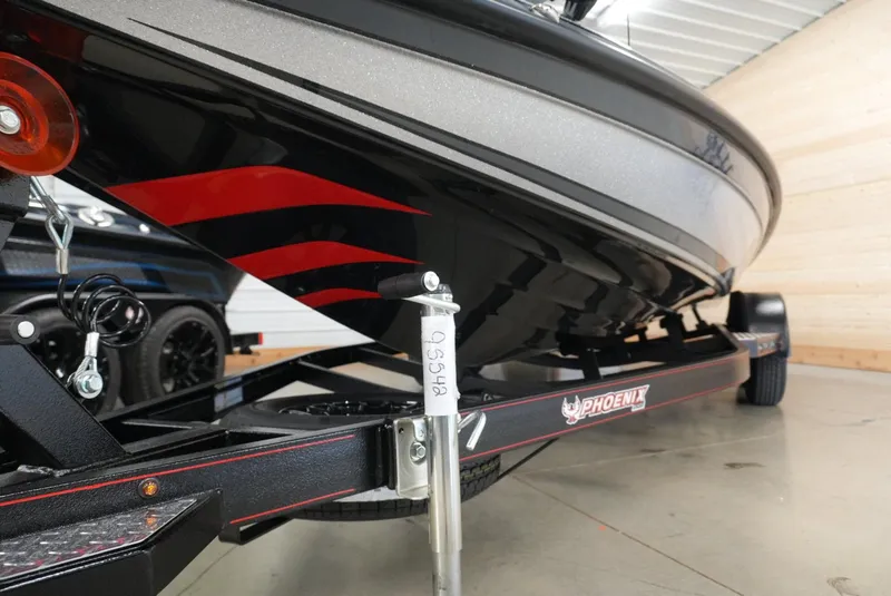 Slide: The Image of 2026 Phoenix 721 ZXL boat on trailer in garage setting. - 5