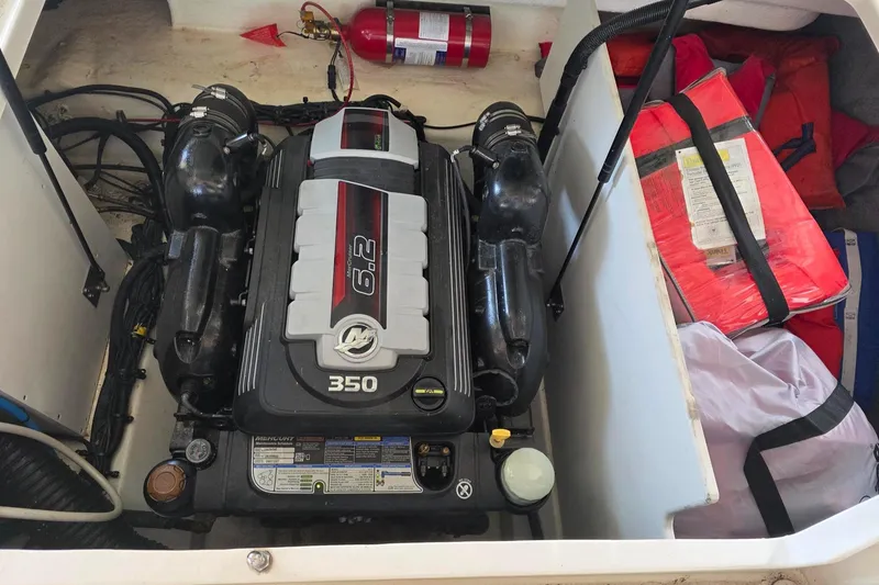 Slide: The Image of Engine compartment of 2019 Sea Ray SDX 290 with Mercury 6.2L 350 HP engine. - 18