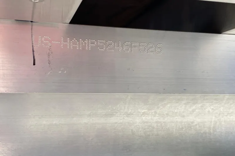 Slide: The Image of 2026 Harris Cruiser 210 hull with serial number engraving. - 12