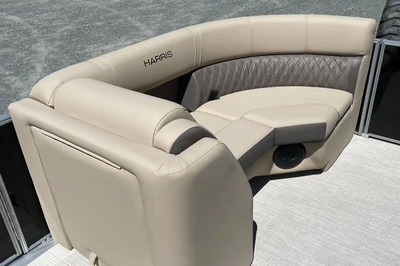 Slide: The Image of Luxurious seating on 2026 Harris Cruiser 210 pontoon boat, featuring elegant beige upholstery. - 5