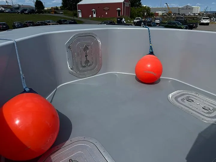 Slide: The Image of Custom T-33 PATROL boat deck with orange buoys, 2022 model. - 3