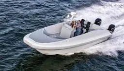 Slide: The Image of Custom T-33 PATROL boat speeding on water, 2022 model, with dual engines. - 7