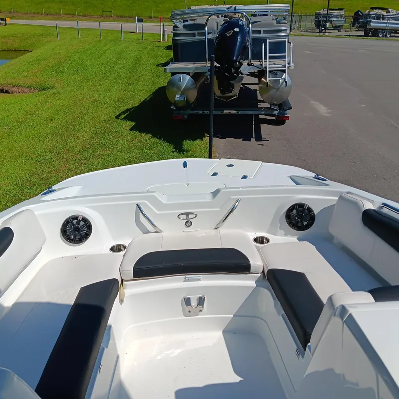 Slide: The Image of Interior view of a 2017 Tahoe 1950 boat with seating and speakers. - 5
