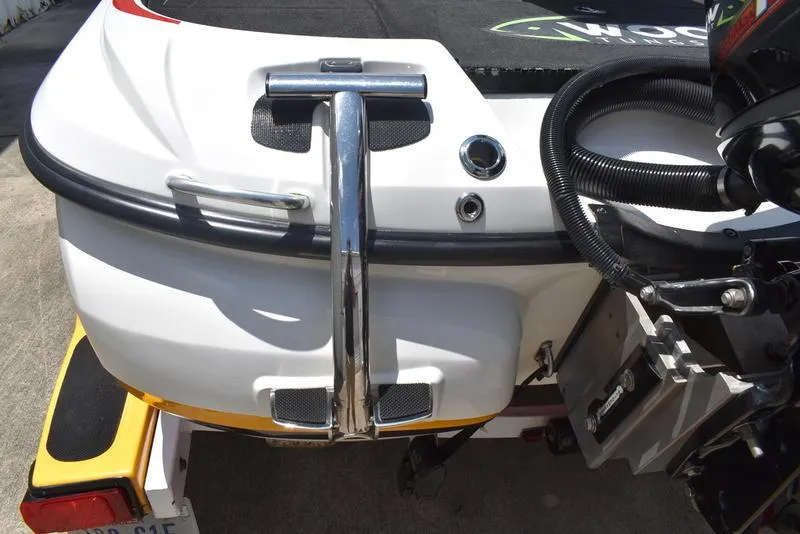 Slide: The Image of Rear view of 2008 Nitro Z9 CDC boat with motor and ladder. - 10