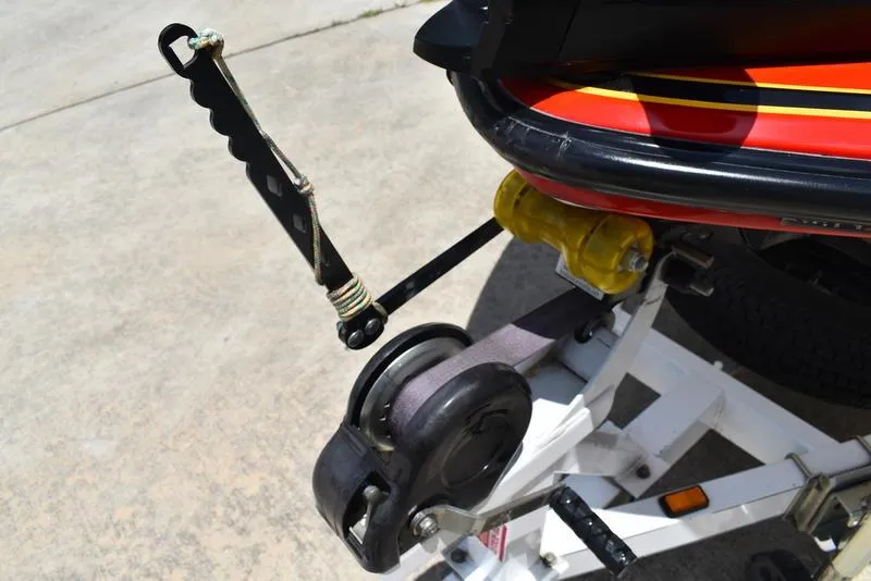 Slide: The Image of Boat trailer winch system on a 2008 Nitro z9cdc, featuring a red and black design. - 14