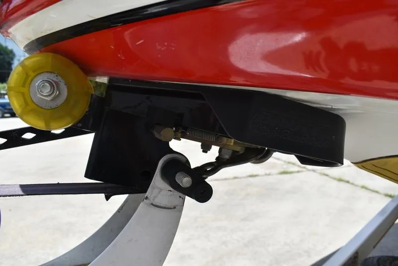 Slide: The Image of Close-up of a 2008 Nitro z9cdc boat trailer component with yellow roller. - 15