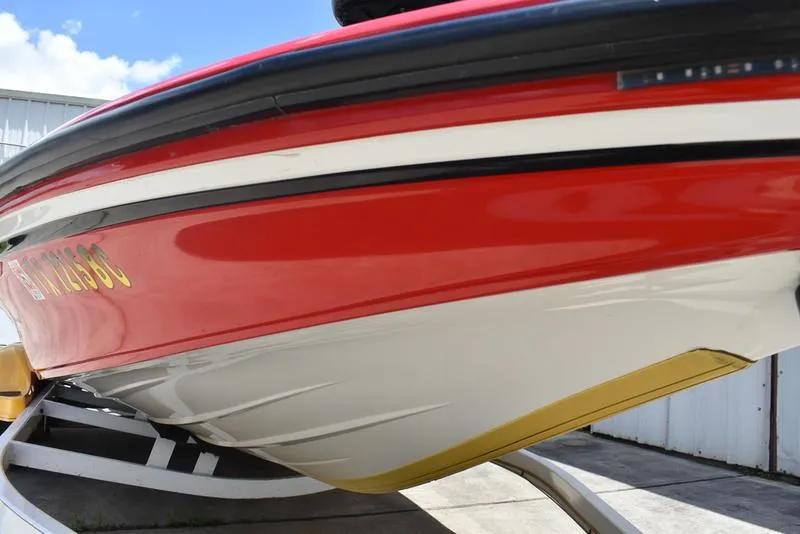 Slide: The Image of Red and white 2008 Nitro z9cdc boat on trailer, viewed from below. - 18
