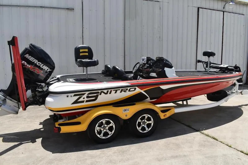 Slide: The Image of 2008 Nitro Z9CDC boat with Mercury Pro XS engine on a trailer. - 2
