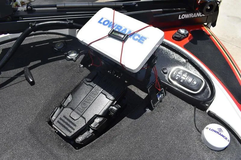 Slide: The Image of Lowrance equipment on a 2008 Nitro z9cdc boat, featuring a control panel and GPS device. - 20