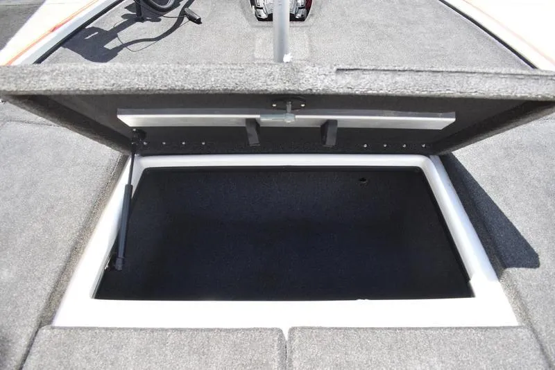 Slide: The Image of Open storage compartment on a 2008 Nitro z9cdc boat. - 25