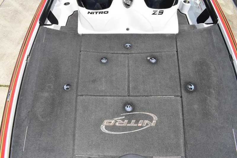 Slide: The Image of 2008 Nitro Z9CDC boat deck with logo and storage compartments. - 28
