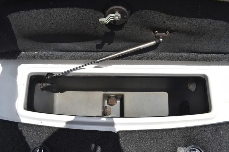 Slide: The Image of 2008 Nitro z9cdc boat storage compartment with hydraulic lift and latch mechanism. - 30