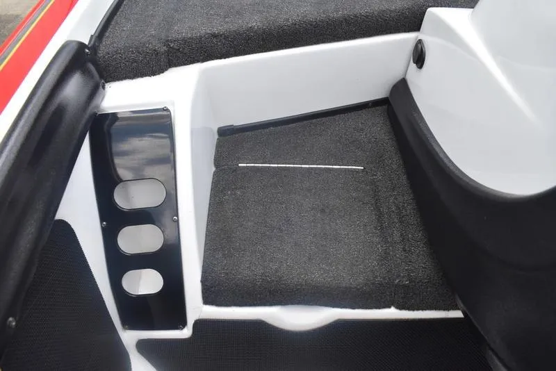 Slide: The Image of Interior of a 2008 Nitro z9cdc boat, featuring carpeted flooring and sleek design elements. - 32