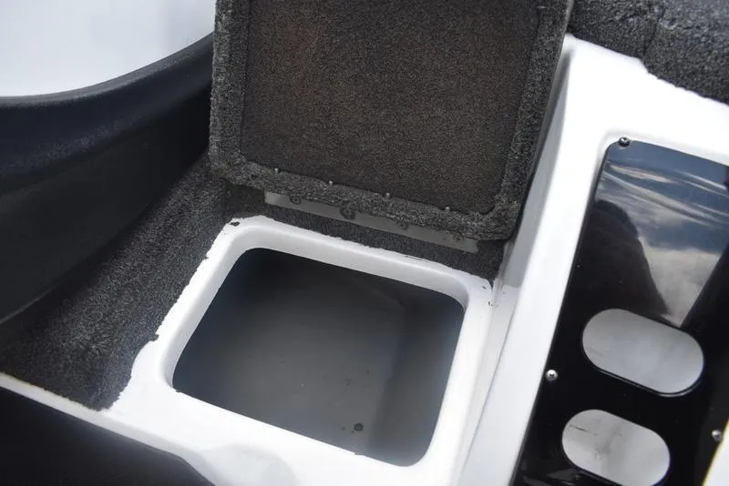 Slide: The Image of Open storage compartment in a 2008 Nitro z9cdc boat interior. - 42