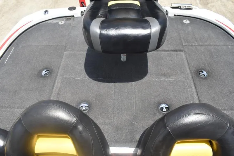 Slide: The Image of 2008 Nitro z9cdc boat interior with black leather seats and carpeted deck. - 51