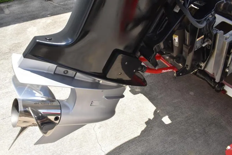 Slide: The Image of Close-up of a 2008 Nitro z9cdc boat motor and propeller on concrete surface. - 8