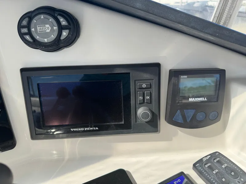 Slide: The Image of Control panel of a 2012 Neptunus 62 Flybridge with Volvo Penta and Maxwell displays. - 31