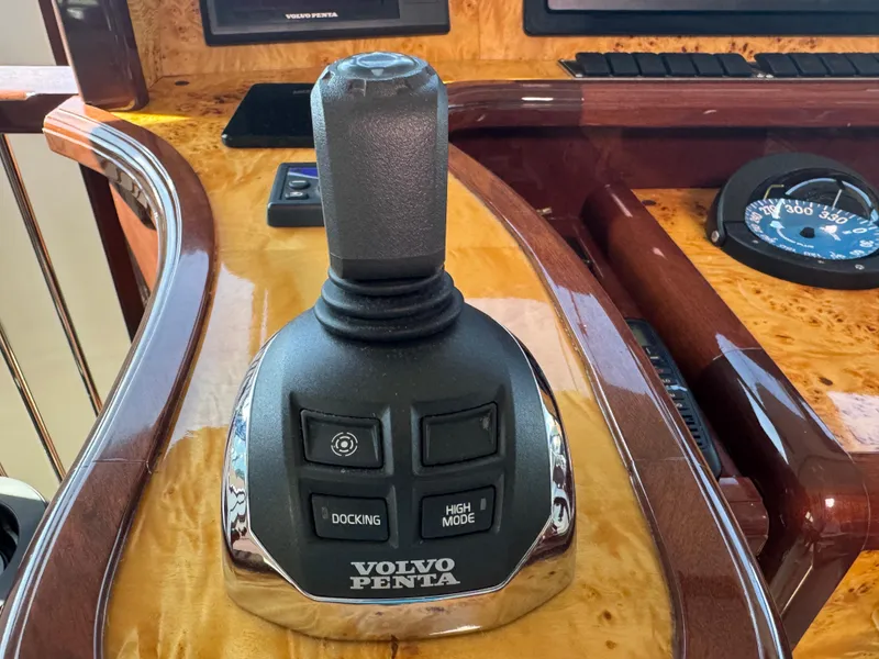 Slide: The Image of Volvo Penta joystick control on 2012 Neptunus 62 Flybridge yacht dashboard. - 36