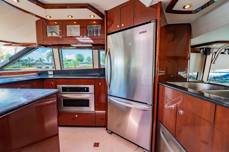 Slide: The Image of Luxurious kitchen interior of 2012 Neptunus 62 Flybridge yacht with stainless steel appliances. - 38