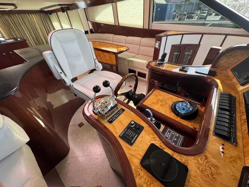 Slide: The Image of Luxurious interior of 2012 Neptunus 62 Flybridge yacht with elegant helm and seating area. - 41