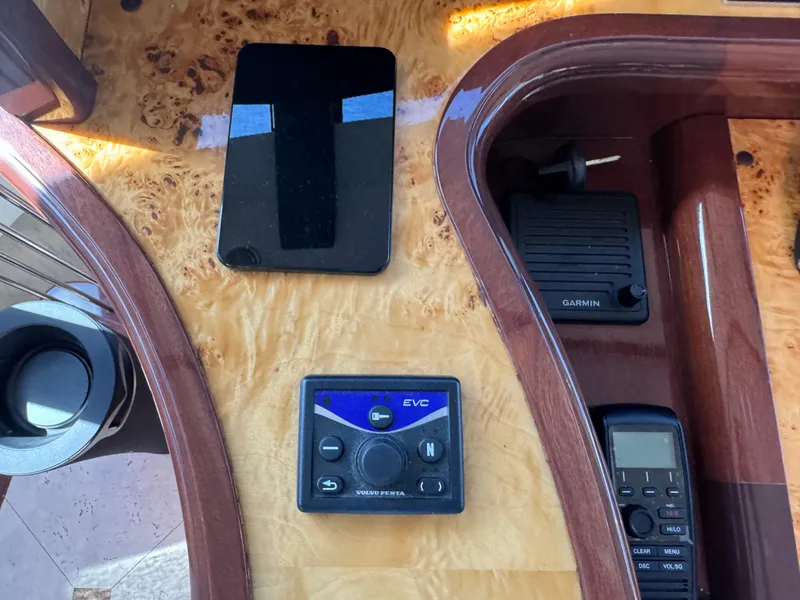 Slide: The Image of Control panel of 2012 Neptunus 62 Flybridge with Garmin and Volvo Penta devices. - 45