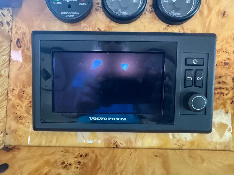 Slide: The Image of Volvo Penta control panel on 2012 Neptunus 62 Flybridge yacht dashboard. - 46