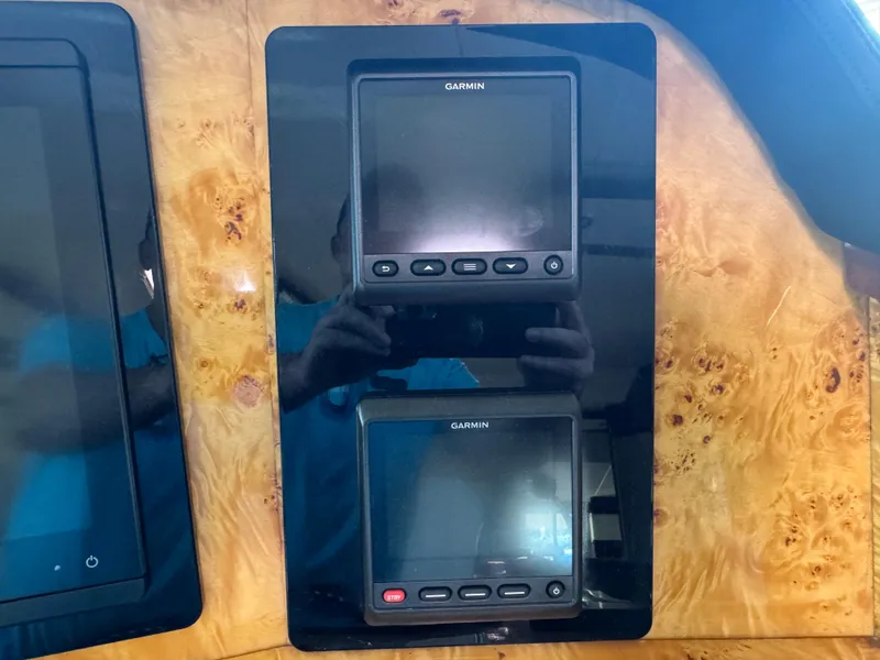 Slide: The Image of Garmin navigation displays on Neptunus 62 Flybridge yacht dashboard, 2012 model. - 47