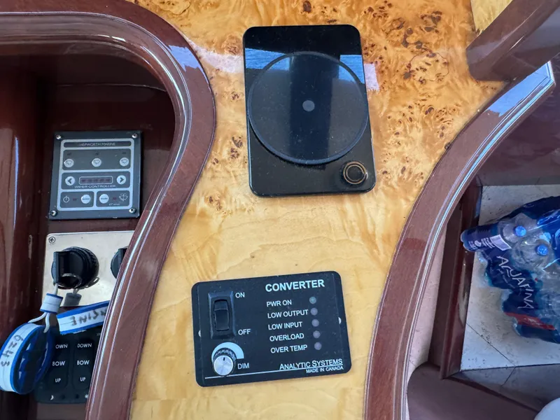 Slide: The Image of Control panel on 2012 Neptunus 62 Flybridge yacht, featuring converter and marine systems. - 50