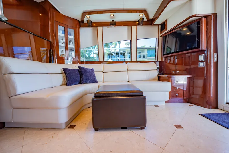Slide: The Image of Luxurious interior of 2012 Neptunus 62 Flybridge yacht with plush seating and modern decor. - 51