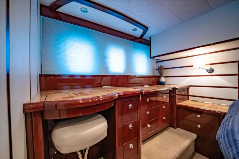 Slide: The Image of Luxurious interior of 2012 Neptunus 62 Flybridge yacht with elegant wood cabinetry. - 57