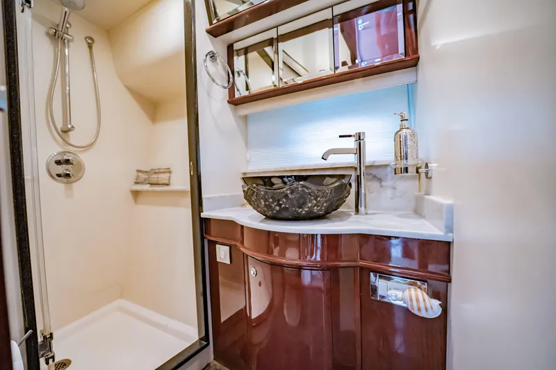 Slide: The Image of Luxurious bathroom in 2012 Neptunus 62 Flybridge yacht with modern sink and shower. - 58