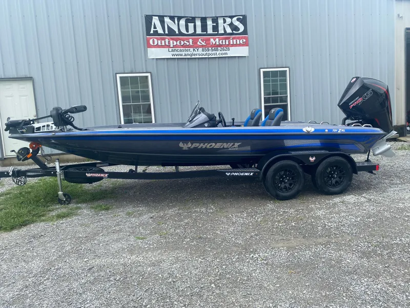 Slide: The Image of 2026 Phoenix 721 ZXL boat on trailer at Anglers Outpost & Marine. - 1