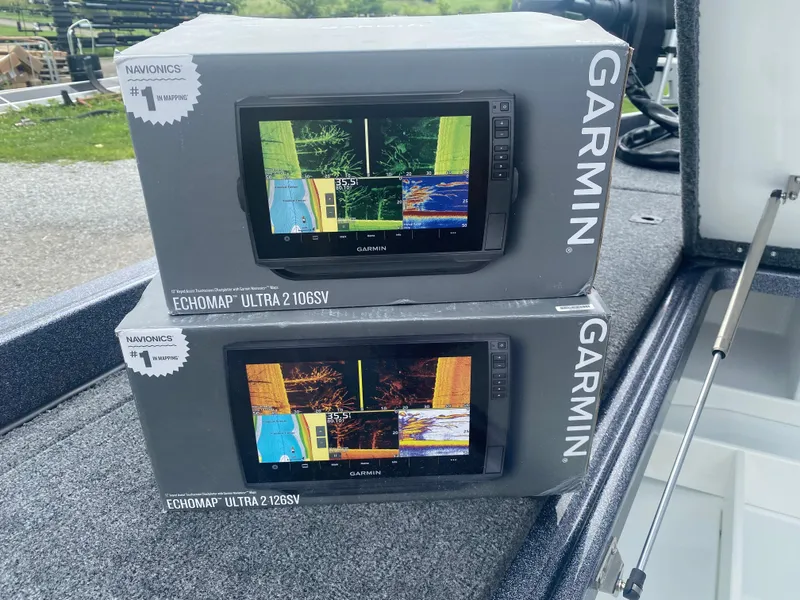 Slide: The Image of Boxes of Garmin ECHOMAP Ultra fish finders on a Phoenix 721 ZXL boat. - 12