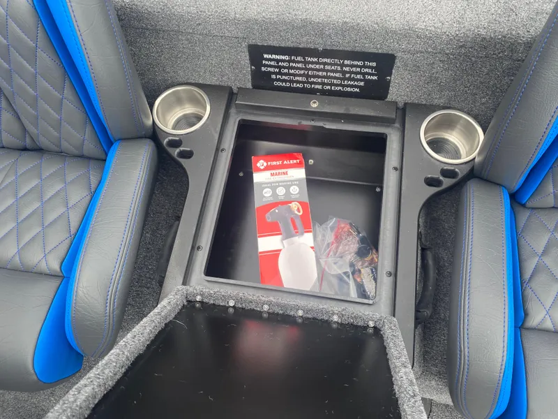 Slide: The Image of Interior of 2026 Phoenix 721 ZXL boat with storage compartment and cup holders. - 19