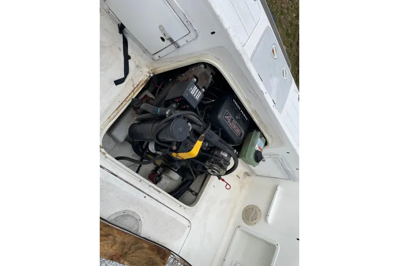 Slide: The Image of Engine compartment of a 1999 Sea Sport 2044 Walk Around boat. - 12