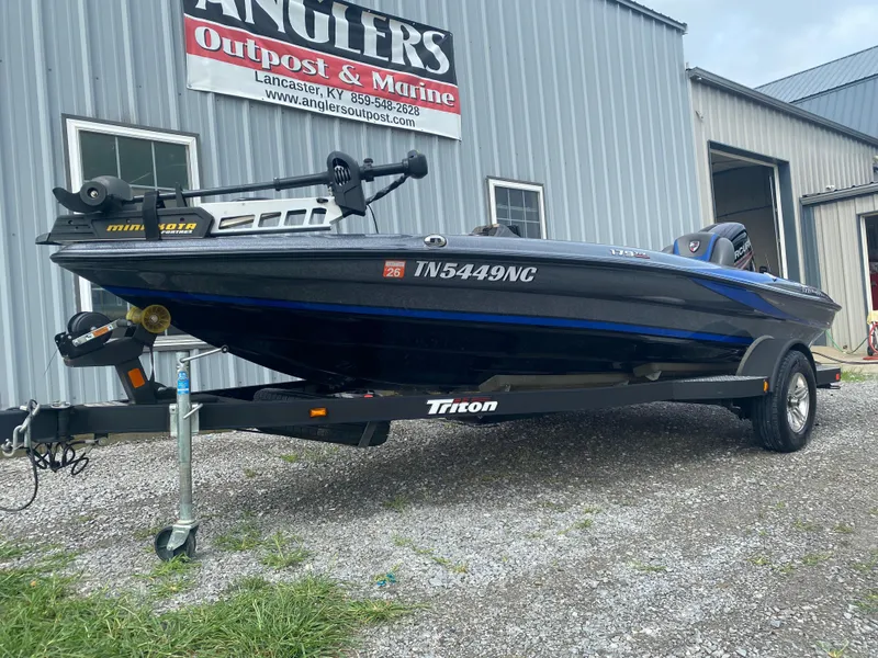 Slide: The Image of 2017 Triton 179 TrX boat on trailer outside Angler's Outpost & Marine. - 4