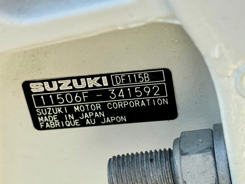 Slide: The Image of Label on Suzuki DF115B engine, Carolina Skiff 21 LS, 2023 model, made in Japan. - 18