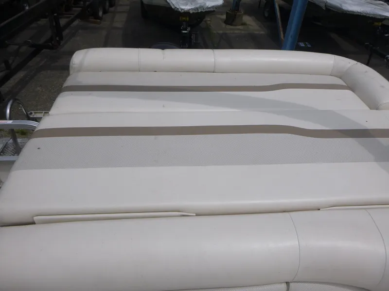 Slide: The Image of 2007 Smoker Craft M-8520 Cruise RE boat seating, beige upholstery with striped design. - 12