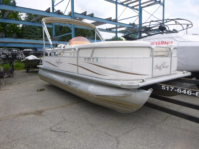 Slide: The Image of 2007 Smoker Craft M-8520 Cruise RE pontoon boat on trailer, outdoor storage. - 3