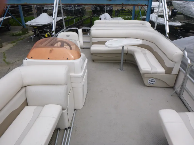 Slide: The Image of 2007 Smoker Craft M-8520 Cruise RE pontoon boat with spacious seating and table. - 5