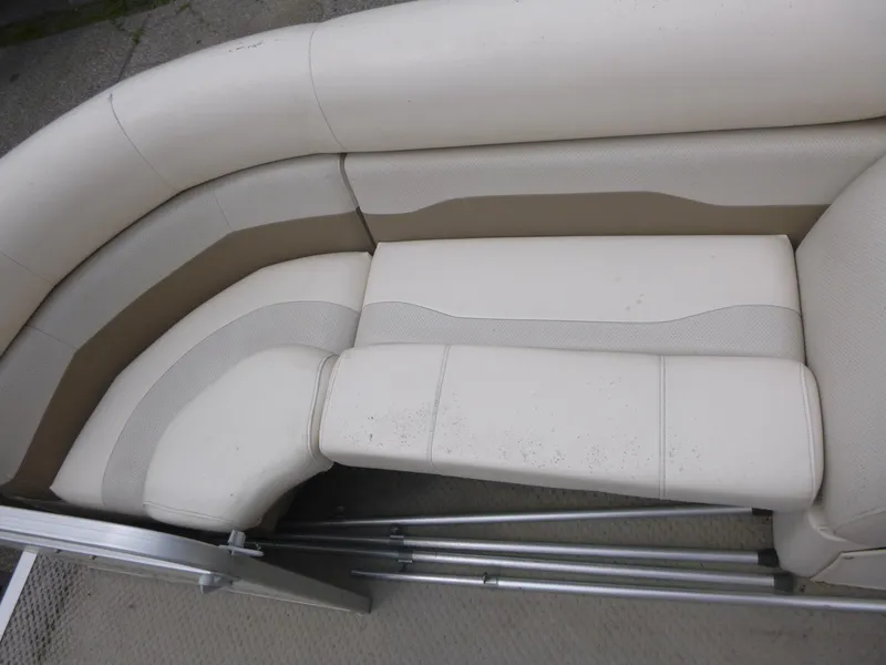 Slide: The Image of 2007 Smoker Craft M-8520 Cruise RE boat seating, beige upholstery, corner view. - 9