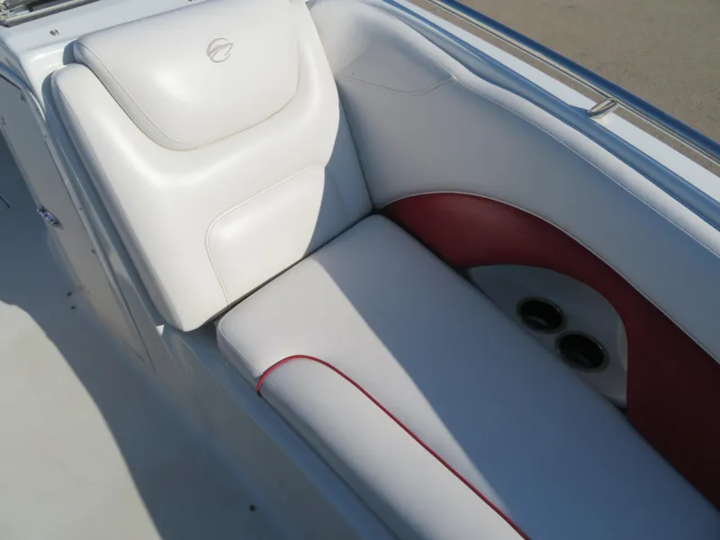 Slide: The Image of 2012 Crownline 275 SS boat interior with white and red seating. - 20