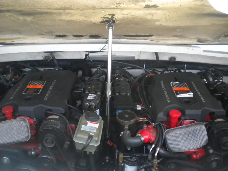 Slide: The Image of 2002 Formula 330 SS engine compartment with dual Volvo Penta engines. - 23
