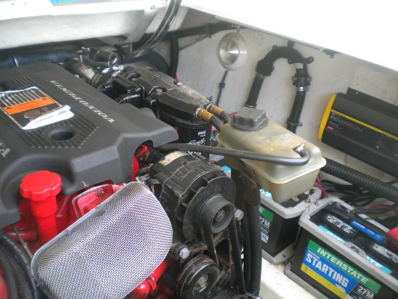 Slide: The Image of Engine compartment of a 2002 Formula 330 SS boat with Volvo Penta components. - 25